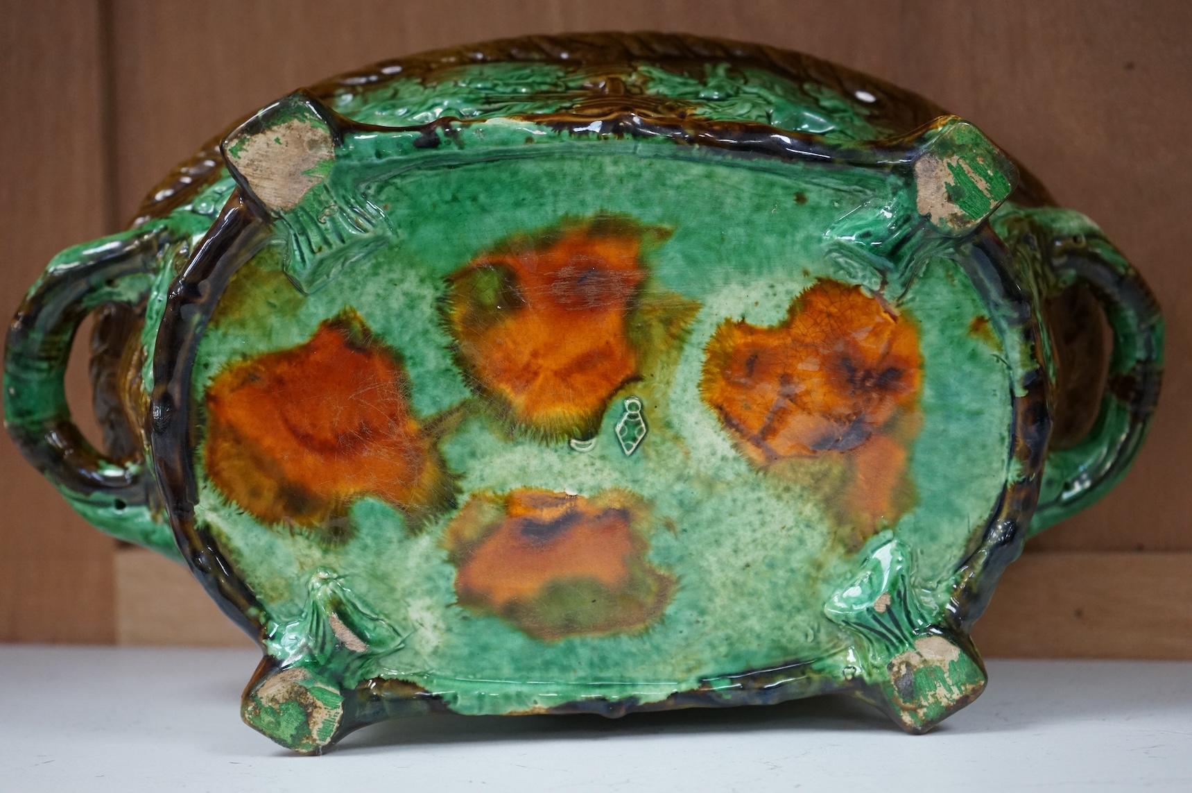 A majolica style game pie dish, 37cm wide